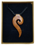 Open tailed koru necklace